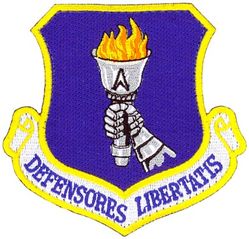 319th Air Base Wing 
Translation: DEFENSORES LIBERTATIS = Defenders of Freedom
