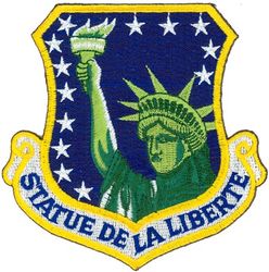 48th Fighter Wing 
Translation: STATUE DE LA LIBERTE = The Statue of Liberty
