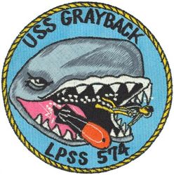 LPSS-574 USS Grayback
Namesake. The gray whale, (Eschrichtius robustus), the sole living species in the genus Eschrichtius
Ordered. 10 Mar 1951
Builder. Mare Island Naval Shipyard, CA
Laid down. 1 Jul 1954
Launched. 2 Jul 1957
Commissioned. 7 Mar 1958, as SSG-574
Decommissioned. 25 May 1964
Recommissioned. 9 May 1969, as LPSS-574
Decommissioned. 15 Jan 1984
Stricken	. 16 Jan 1984
Homeport. Pearl Harbor, HI
Motto. De Profundis Futurus
Fate. Sunk as a target near Subic Bay, 13 Apr 1986
Class and type. Grayback-class submarine
Displacement:	
1,740 long tons (1,768 t) light
2,768 long tons (2,812 t) full
Length. 273 ft (83 m) later extended to 317 ft 7 in (96.80 m)
Beam. 27 ft 2 in (8.28 m)
Draft. 19 ft (5.8 m)
Propulsion. 3 Fairbanks-Morse Diesel engines, 2 Elliott electric motors
Speed. 15 knots (28 km/h; 17 mph) surfaced; 12 knots (22 km/h; 14 mph) submerged
Complement. 84 officers and men
Armament:	
2 × Regulus missile hangars (4 x Regulus I missiles or 2 x Regulus II missiles)
8 × 21 inch (533 mm) torpedo tubes (6 bow, 2 stern)

