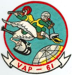 Heavy Photographic Squadron 61 (VAP-61) 
Established as Patrol Squadron SIXTY ONE (VP-61) on 20 Jan 1951. Redesignated: Photographic Squadron SIXTY ONE (VJ-61) on 5 Mar 1952; Heavy Photographic Squadron SIXTY ONE (VAP-61) "World Recorders" in Apr 1956. Composite Photographic Reconnaissance Squadron SIXTY ONE (VCP-61) on 1 Jul 1959. Heavy Photographic Squadron SIXTY ONE (VAP-61) on 1 Jul 1961. Disestablished on 1 Jul 1971.

North American AJ-2P Savage, 1952
Vought F8U-1P Crusader, 1959-1961
Douglas A3D-2P/RA-3B/KA-3B Skywarrior, 1959-1971

Insignia (2nd insignia) approved on 11 Jan 1961



