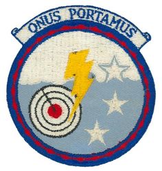 6521st Test Squadron (Support) 
Translation: ONUS PORTAMUS = We Carry the Load 
