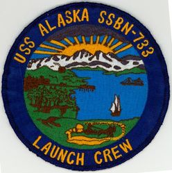 SSBN-732 USS Alaska Launch Crew
Namesake. State of Alaska
Ordered. 27 Feb 1978
Builder. General Dynamics Electric Boat, Groton, Connecticut
Laid down. 9 Mar 1983
Launched. 12 Jan 1985
Commissioned. 25 Jan 1986
Homeport. Kings Bay, GA
Motto. Alert, Confident, Able
Status. in active service
Class and type. Ohio-class ballistic missile submarine
Displacement:	
16,764 long tons (17,033 t) surfaced
18,750 long tons (19,050 t) submerged
Length. 560 ft (170 m)
Beam. 42 ft (13 m)
Draft. 38 ft (12 m)
Propulsion:	
1 × S8G PWR nuclear reactor[1] (HEU 93.5%)
2 × geared turbines
1 × 325 hp (242 kW) auxiliary motor
1 × shaft @ 60,000 shp (45,000 kW)
Speed. Greater than 25 knots (46 km/h; 29 mph)
Test depth. Greater than 800 feet (240 m)
Complement. 15 officers, 140 enlisted
Armament:	
MK-48 torpedoes
20 × Trident II D-5 ballistic missiles

