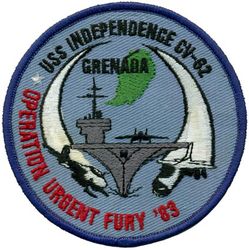 CV-62 USS Independence Operation URGENT FURY 1983
Namesake. Independence, condition of a nation in which the population exercise self-government, and sovereignty over its territory
Ordered. 2 Jul 1954
Builder. New York Navy Yard, NY
Cost. $182.3 million
Laid down. 1 Jul 1955
Launched. 6 Jun 1958
Commissioned. 10 Jan 1959
Decommissioned. 30 Sep 1998
Reclassified. CV-62, 28 Feb 1973
Stricken. 8 Mar 2004
Motto. Freedom's Flagship
Fate. Scrapped from 2017-2019
Class and type. Forrestal-class aircraft carrier
Displacement:	
60,000 long tons (61,000 t) standard
80,643 long tons (81,937 t) full load
Length. 1,070 ft (326.1 m)
Beam:	
130.0 ft (39.63 m) waterline
270 ft (82.3 m) extreme
Draft	37 ft (11.3 m)
Propulsion:	
4 Westinghouse geared turbines, four shafts, 280,000 shaft horsepower (210,000 kW)
8 Babcock & Wilcox boilers
Speed. 34 knots (63 km/h; 39 mph)
Range:	
8,000 nautical miles (15,000 km) at 20 knots (37 km/h)
4,000 nautical miles (7,400 km) at 30 knots (56 km/h)
Complement: 3,126 (ship's crew), 2,089 (air wing), 70 (flag staff), 72 (Marines)
Sensors and processing systems:	
AN/SPS-48C 3D air search radar
AN/SPS-49(V5) 2D air search radar
AN/SPS-67(V1) surface search radar
AN/SPS-64 navigation radar
Mk 91 Missile fire-control radar
Electronic warfare & decoys:	
AN/SLQ-29
Mark 36 SRBOC decoy rocket launcher
Armament:	
8 Ã— 5"/54 caliber Mark 42 guns (127 mm)
2Ã— 8 NATO Sea Sparrow
3Ã— Phalanx CIWS
Aircraft carried: 70-90

