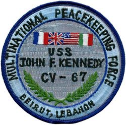 CV-67 USS John F Kennedy MULTINATIONAL PEACEKEEPING FORCE 1983
Namesake. John F Kennedy, (1917-1963), 35th president of the USA
Awarded. 30 Apr 1964
Builder. Newport News Shipbuilding, VA
Laid down. 22 Oct 1964
Launched. 27 May 1967
Christened. 27 May 1967
Commissioned. 7 Sep 1968
Decommissioned. 23 Mar 2007
Stricken. 16 Oct 2009
Fate. Sold to International Shipbreaking Limited on 6 Oct 2021 to be dismantled 
Motto Date Nolite Rogare (Give, do not ask)
Type. variant of the Kitty Hawk class aircraft carrier
Displacement:	
60,728 tons light
82,655 tons full load
21,927 tons deadweight
Length. 1,052 ft (321 m) overall, 990 ft (300 m) waterline
Beam. 252 ft (77 m) extreme, 130 ft (40 m) waterline
Height. 192 ft (59 m) from top of the mast to the waterline
Draft. 36 ft (11 m) maximum, 37 ft (11 m) limit
Installed power. 8 × Babcock & Wilcox boilers, 1,200 PSI 280,000 shp (210 MW)
Propulsion:	
4 × steam turbines
4 shafts
Speed	34 knots (63 km/h; 39 mph)
Capacity. 5,000+
Complement. 3,297 officers and men (without jet commands & crews)
Armament:	
2 × GMLS Mk 29 launchers for Sea Sparrow missiles
2 × Phalanx CIWS
2 × RAM launchers
Aircraft carried. 	80+

