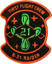 420th Flight Test Squadron B-21 First Flight Crew
The first flight crew for the B-21 Raider is expected to be Air Force Lt. Col. Clifton Bell and Northrop Grumman test pilot Chris Moss. They will pilot the B-21, designated T1, on its maiden flight, November 10, 2023. The flight occurred at Northrop Grumman's Palmdale, California, facility, with the aircraft then relocating to Edwards AFB. 
