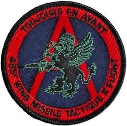 71st Tactical Missile Squadron A Flight
This unofficial patch depicts a griffin superimposed over the letter "A" with both encircled by a border displaying the designation "485e Wing Missile Tactique 'A' Flight" below, and the motto “TOUJOURS EN AVANT” (Always in the Front) above.  The griffin is wearing a Kevlar combat helmet and holding a wrench in his right claw and a weapon in his left claw. 
Keywords: subdued