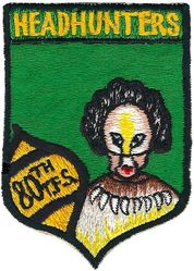 80th Tactical Fighter Squadron 
Patch details changed and background changed to green in 1954 when the 80th FBS joined the 49 FBW on Kadena. Color changed as the 80th was the 4th unit assigned and one already used yellow, so green was selected. Early after becoming a TFS and now with the 8th TFW, they reverted to yellow background but did retain green into the TFS era for a short time. Japan made.
