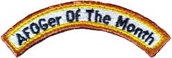 Air Force Orientation Group AFOGer of the Month Tab
Worn over the top of the Air Force Orientation Group disc.
