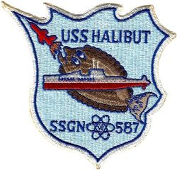 SSGN-587 USS Hilibut
Namesake. The halibut, flatfish in the genera Hippoglossus and Reinhardtius, family of flounders
Laid down. 11 Apr 1957
Launched. 9 Jan 1959
Commissioned. 4 Jan 1960
Decommissioned. 30 Jun 1976
Reclassified. From SSGN-587 to SSN-587, 15 Apr 1965
Stricken. 30 Apr 1986
Fate. Disposed of through the Ship-Submarine Recycling Program, 9 September 1994
Type: SSGN 1960-1965; Attack submarine 1965-1976
Displacement. 3655 tons surfaced, 5000 tons submerged
Length. 	350 ft (110 m)
Beam. 29 ft (8.8 m)
Draft. 28 ft (8.5 m)
Propulsion. S3W reactor, 7300 shp; two turbines, two shafts[1]
Speed. 15/20+kt (28/37 km/h) (surfaced/submerged)[1]
Range. unlimited except by food supplies
Complement. 9 officers and 88 men
Armament:	
1 Regulus missile launcher (5 x Regulus I or 2 x Regulus II missiles)
6 × 21 inch (533 mm) torpedo tubes (four forward, two aft)

