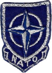 Tactical Air Command/North Atlantic Treaty Organization 
Worn by units with a dual TAC/NATO commitment. The 4 TFW, 49 TFW and 67 TRW are examples. This one was used by a 67 TRW/417 TFS pilot circa 1969. German made.
