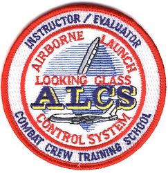 7th Airborne Command and Control Squadron Airborne Launch Control System Combat Crew Training School Instructor/Evaluator
This patch was created in January 1994 by Maj Greg Ogletree to replace the ORT Instructor version because ALCS ORT became the ALCS Combat Crew Training School at that time. Nevertheless, I've labeled this a 7 ACCS patch because 6 months later the 2 ACCS was replaced by the 7 ACCS and the CCTS continued, as such until April 1996. Because the CCTS was a formal Air Force school, the Commander of the 7 ACCS was its Commandant (even though he was in ACC and the school's faculty were all in AFSPC). All CCTS faculty were both instructor and evaluator certified. They trained and evaluated the joint staff in USSTRATCOM who operated the weapon system. 
