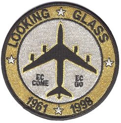 7th Airborne Command and Control Squadron Looking Glass 37th Anniversary
Commemorative patch that celebrated the USAF's "Looking Glass" mission from 1961-1998. Some consider it the 7 ACCS inactivation patch because the unit was inactivated when the Navy took over the mission in 1998. "EC Come, EC Go" is obviously a play on words (easy come, easy go), referring to the EC-135 aircraft (even though the aircraft didn't carry that designation in its earliest years). The patch is tinsel. 
