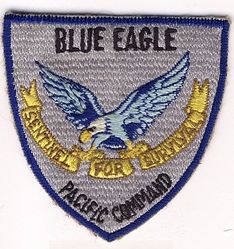 United States Pacific Command Airborne Command Post BLUE EAGLE
"Blue Eagle" was the nickname of the US Pacific Command Airborne Command Post (ABNCP), and "Sentinel For Survival" was its motto.
I believe the brown motto on the scroll is the earliest version. 
