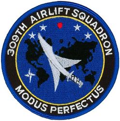 309th Airlift Squadron (FLAW)
The red dot near top center should be in a white 5-pointed star but the star is missing.  -GWO

