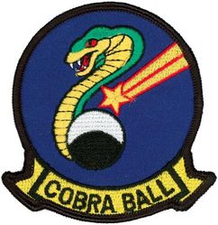 45th Reconnaissance Squadron RC-135S Cobra Ball
The original Cobra Ball patch (this is a later one) was designed by Capt. Bob Davis when he was a Tactical Coordinator (TC) on Cobra Ball I (#61-2663) in 1969.  The ball and cobra on the patch are self-explanatory; the shooting star is a reference to the "Burning Star" Operations Order under which Cobra Ball missions were flown.  -GWO 
