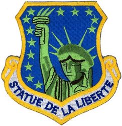 48th Fighter Wing 
Translation: STATUE DE LA LIBERTE = The Statue of Liberty
