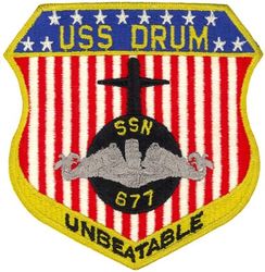 SSN-677 USS Drum
Namesake. The drum, also known as the croaker or hardhead, any of various fishes of the Sciaenidae family
Ordered. 15 Mar 1967
Builder.	Mare Island Naval Shipyard, Vallejo, CA
Laid down. 20 Aug 1968
Launched. 23 May 1970
Commissioned.	15 Apr 1972
Decommissioned. 30 Oct 1995
Stricken. 30 Oct 1995
Motto. Pride Runs Deep
Honors and awards: Navy Unit Commendation 1975; Meritorious Unit Commendation 1976; Meritorious Unit Commendation 1979; Navy Expeditionary Medal Iran/Indian Ocean 1981; Meritorious Unit Commendation 1984; Navy Expeditionary Medal 1984; Meritorious Unit Commendation 1988–1989; Navy Unit Commendation 1989; Battle Efficiency Award (Battle "E") Fiscal year 1990; Meritorious Unit Commendation 1990–1991; Battle "E" Fiscal Year 1991; Meritorious Unit Commendation 1992
Fate. Scrapped via Ship and Submarine Recycling Program
Class and type. Sturgeon-class attack submarine
Displacement:	
3,978 long tons (4,042 t) light
4,270 long tons (4,339 t) full
292 long tons (297 t) dead
Length. 292 ft 3 in (89.08 m)
Beam. 31 ft 8 in (9.65 m)
Draft. 28 ft 8 in (8.74 m)
Installed power. 15,000 shp (11,185 kw)
Propulsion. One S5W nuclear reactor, two steam turbines, one screw
Speed:	
15 knots (28 km/h; 17 mph) surfaced
25 knots (46 km/h; 29 mph) submerged
Test depth. 1,300 ft (396 m)
Complement. 109 (14 officers, 95 enlisted)
Armament. 4 × 21-inch (533 mm) torpedo tubes

