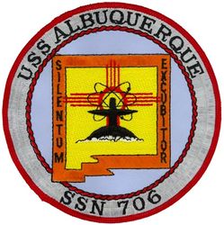 SSN-706 USS Albuquerque
Name. USS Albuquerque (SSN-706)
Namesake. Albuquerque, New Mexico
Awarded. 31 Oct 1973
Builder. General Dynamics Corporation
Laid down. 27 Dec 1979
Launched. 13 Mar 1982
Commissioned. 21 May 1983
Decommissioned. 27 Feb 2017
Out of service. 16 Oct 2015
Stricken	. 27 Feb 2017
Homeport. Bremerton, Washington
Motto. Silentum Excubitor (Latin for "Silent Sentinel")
Status. Stricken, to be disposed of by submarine recycling
Class and type. Los Angeles-class submarine
Displacement. 5,758 tons light, 6,120 tons full, 362 tons dead
Length. 110.3 m (361 ft 11 in)
Beam. 10 m (32 ft 10 in)
Draft. 9.7 m (31 ft 10 in)
Propulsion. S6G nuclear reactor
Speed. Surfaced: 20 knots (23 mph; 37 km/h)
Submerged.  +20 knots (23 mph; 37 km/h) (official)
Complement. 12 officers, 98 men
Armament. 4 × 21 in (533 mm) bow tubes, 10 Mk48 ADCAP torpedo reloads, Tomahawk land attack missile block 3 SLCM range 1,700 nautical miles (3,100 km), Harpoon anti–surface ship missile range 70 nautical miles (130 km), mine laying Mk67 mobile Mk60 captor mines

