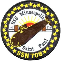 SSN-708 USS Minneapolis–Saint Paul 
Namesake. Minneapolis-Saint Paul, MN
Ordered. 31 Oct 1973
Laid down. 20 Jan 1981
Launched. 19 Mar 1983
Commissioned. 10 Mar 1984
Decommissioned. 28 Aug 2008
Out of service. 22 Jun 2007
Stricken. 28 Aug 2008
Homeport. Pearl Harbor, HI
Status. Stricken, to be disposed of by submarine recycling.
Class and type. Los Angeles-class submarine
Displacement:	
5,763 long tons (5,855 t) surfaced
6,130 long tons (6,228 t) submerged
6,136,730 long tons (6,235,206 t) dead
Length. 362 ft (110.3 m)
Beam. 33 ft (10 m)
Draft. 32 ft (9.8 m)
Propulsion. S6G reactor
Complement. 12 officers, 98 men
Sensors and processing systems	BQQ-5 passive sonar, BQS-15 detecting and ranging sonar, WLR-8 fire control radar receiver, WLR-9 acoustic receiver for detection of active search sonar and acoustic homing torpedoes, BRD-7 radio direction finder
Armament: 
4 × 21 in (533 mm) bow tubes, 10 Mk48 ADCAP torpedo reloads
Tomahawk land attack missile block 3 SLCM range 1,700 nautical miles (3,100 km)
Harpoon anti–surface ship missile range 70 nautical miles (130 km)
mine laying Mk67 mobile Mk60 captor mines

