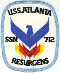 SSN-712 USS Atlanta 
Namesake. Atlanta, GA
Awarded. 1 Aug 1975
Builder. Newport News Shipbuilding
Laid down. 17 Aug 1978
Launched. 16 Aug 1980
Commissioned.	6 Mar 1982
Decommissioned. 16 Dec 1999
Stricken	. 16 Dec 1999
Motto. Resurgens (Latin: "Rise Again")
Fate. To be disposed of by submarine recycling
Class and type. Los Angeles-class submarine
Displacement. 5,732 tons light, 6,160 tons full, 428 tons dead
Length.	110.3 m (361 ft 11 in)
Beam. 10 m (32 ft 10 in)
Draft. 9.7 m (31 ft 10 in)
Propulsion. S6G nuclear reactor
Speed: Surfaced. 20 knots (23 mph; 37 km/h)
Submerged. +20 knots (23 mph; 37 km/h) (official)
Complement. 12 officers, 115 ratings
Sensors and processing systems. BQQ-5 passive sonar, BQS-15 detecting and ranging sonar, WLR-8V(2) ESM receiver, WLR-9 acoustic receiver for detection of active search sonar and acoustic homing torpedoes, BRD-7 radio direction finder, BPS-15 radar
Armament:
4 × 21 in (533 mm) torpedo tubes
Mark 48 torpedo
Harpoon missiles
Tomahawk cruise missile

