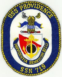 SSN-719 USS Providence 
Namesake. City of Providence
Awarded. 16 Apr 1979
Builder. General Dynamics Electric Boat
Laid down. 14 Oct 1982
Launched. 4 Aug 1984
Acquired. 26 Jun 1985
Commissioned. 27 Jul 1985
Decommissioned. 22 Aug 2022
Out of service. 2 Dec 2021
Stricken	. 22 Aug 2022
Motto. Providentia Remedium Belli (Latin: "Providence for war is the best prevention for it")
Status. Stricken, Final Disposition Pending
Class and type. Los Angeles-class submarine
Displacement:
5,781 long tons (5,874 t) light
6,184 long tons (6,283 t) full
403 long tons (409 t) dead
Length. 110.3 m (361 ft 11 in)
Beam. 10 m (32 ft 10 in)
Draft. 9.4 m (30 ft 10 in)
Propulsion:	
1 × S6G PWR nuclear reactor with D2W core (165 MW), HEU 93.5%[1][2]
2 × steam turbines (33,500) shp
1 × shaft
1 × secondary propulsion motor 325 hp (242 kW)
Speed. Surfaced:20 knots (23 mph; 37 km/h); Submerged: +20 knots (23 mph; 37 km/h) (official)
Complement. 12 officers; 98 enlisted
Sensors and processing systems. BQQ-10 passive sonar, BQS-15 detecting and ranging sonar, BYG-1 fire control, BLQ-10 radio and ESM, BPS-15H radar
Armament: 
4 × 21 in (533 mm) bow tubes, 10 Mk48 ADCAP torpedo reloads
Tomahawk land attack missile block 3 SLCM range 1,700 nautical miles (3,100 km)
Harpoon anti–surface ship missile range 70 nautical miles (130 km)
mine laying Mk67 mobile Mk60 captor mines

