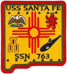 SSN-763 USS Santa Fe 
Namesake. The City of Santa Fe, New Mexico
Awarded. 21 Mar 1986
Builder. General Dynamics Electric Boat
Laid down. 9 Jul 1991
Launched. 12 Dec 1992
Sponsored by. Joy Johnson
Commissioned. 	8 Jan 1994
Class and type. Los Angeles-class submarine
Displacement:	
6,000 long tons (6,096 t) light
6,927 long tons (7,038 t) full
927 long tons (942 t) dead
Length. 110.3 m (361 ft 11 in)
Beam. 10 m (32 ft 10 in)
Draft. 9.4 m (30 ft 10 in)
Propulsion:	
1 × S6G PWR nuclear reactor with D2W core (165 MW), HEU 93.5%[1][2]
2 × steam turbines (33,500) shp
1 × shaft
1 × secondary propulsion motor 325 hp (242 kW)
Speed:	
Surfaced: 20 knots (23 mph; 37 km/h)
Submerged: +20 knots (23 mph; 37 km/h) (official)
Complement. 12 officers, 98 men
Sensors and processing systems. BSY-1/BQQ-10 passive sonar, BQS-15 detecting and ranging sonar, WLR-8 fire control radar receiver, WLR-9 acoustic receiver for detection of active search sonar and acoustic homing torpedoes, BRD-7 radio direction finder
Armament. 4 × 21 in (533 mm) bow tubes, 10 Mk48 ADCAP torpedo reloads, Tomahawk land attack missile block 3 SLCM range 1,700 nautical miles (3,100 km), Harpoon anti–surface ship missile range 70 nautical miles (130 km), mine laying Mk67 mobile Mk60 captor mines

