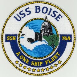 SSN-764 USS Boise 
Namesake. The City of Boise, Idaho
Awarded. 6 Feb 1987
Builder.	Newport News Shipbuilding and Drydock Company
Laid down. 25 Aug 1988
Launched. 23 Mar 1991
Commissioned. 7 Nov 1992
Motto. A One Ship Fleet
Class and type. Los Angeles-class submarine
Displacement:
6,000 long tons (6,096 t) light
6,927 long tons (7,038 t) full
927 long tons (942 t) dead
Length. 110.3 m (361 ft 11 in)
Beam. 10 m (32 ft 10 in)
Draft. 9.4 m (30 ft 10 in)
Propulsion:	
1 × S6G PWR nuclear reactor with D2W core (165 MW), HEU 93.5%
2 × steam turbines (33,500) shp
1 × shaft
1 × secondary propulsion motor 325 hp (242 kW)
Speed:	
Surfaced: 20 knots (23 mph; 37 km/h)
Submerged: +20 knots (23 mph; 37 km/h) (official)
Complement. 13 officers, 121 Enlisted
Sensors and processing systems. BQQ-5 passive sonar, BQS-15 detecting and ranging sonar, WLR-8 fire control radar receiver, WLR-9 acoustic receiver for detection of active search sonar and acoustic homing torpedoes, BRD-7 radio direction finder
Armament: 4 × 21-inch (533 mm) bow tubes, 10 Mk48 ADCAP torpedo reloads, Tomahawk land attack missile block 3 SLCM range 1,700 nautical miles (3,100 km), Harpoon anti–surface ship missile range 70 nautical miles (130 km), mine laying Mk67 mobile Mk60 captor mines


