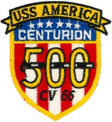 CV-66 USS America 500 Carrier Landings
Namesake. United States of America
Ordered. 25 Nov 1960
Builder. Newport News Shipbuilding, VA
Laid down. 9 Jan 1961
Launched. 1 Feb 1964
Commissioned. 23 Jan 1965
Decommissioned. 9 Aug 1996
Reclassified. CV-66, 30 Jun 1975
Stricken	.  Aug 1996
Homeport. Norfolk, VA
Motto. Don't Tread on Me
Fate. Scuttled after live-fire testing 14 May 2005
Class and type. Kitty Hawk-class aircraft carrier
Displacement. 61,174 long tons (62,156 t) (light), 83,573 long tons (84,914 t) (full load)
Length. 990 ft (300 m) (waterline), 1,048 ft (319 m) overall
Beam. 248 ft (76 m) extreme, 129 ft (39 m) waterline
Draft. 38 ft (12 m) (maximum), 37 ft (11 m) (limit)
Installed power. 280,000 hp (210 MW)
Propulsion:	
4 × steam turbines
8 × boilers
4 × shafts
Speed. 34 kn (39 mph; 63 km/h)
Complement. 502 officers, 4684 men
Sensors and processing systems:	
AN/SPS-49
AN/SPS-48
Electronic warfare & decoys. AN/SLQ-32
Armament:	
Terrier missile (replaced with Sea Sparrow)
Phalanx CIWS
Aircraft carried. 	about 79

