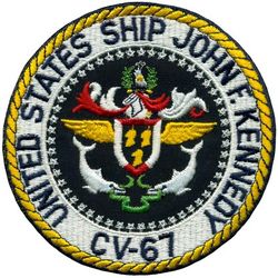 CV-67 USS John F Kennedy 
Namesake. John F Kennedy, (1917-1963), 35th president of the USA
Awarded. 30 Apr 1964
Builder. Newport News Shipbuilding, VA
Laid down. 22 Oct 1964
Launched. 27 May 1967
Christened. 27 May 1967
Commissioned. 7 Sep 1968
Decommissioned. 23 Mar 2007
Stricken. 16 Oct 2009
Fate. Sold to International Shipbreaking Limited on 6 Oct 2021 to be dismantled 
Motto Date Nolite Rogare (Give, do not ask)
Type. variant of the Kitty Hawk class aircraft carrier
Displacement:	
60,728 tons light
82,655 tons full load
21,927 tons deadweight
Length. 1,052 ft (321 m) overall, 990 ft (300 m) waterline
Beam. 252 ft (77 m) extreme, 130 ft (40 m) waterline
Height. 192 ft (59 m) from top of the mast to the waterline
Draft. 36 ft (11 m) maximum, 37 ft (11 m) limit
Installed power. 8 × Babcock & Wilcox boilers, 1,200 PSI 280,000 shp (210 MW)
Propulsion:	
4 × steam turbines
4 shafts
Speed	34 knots (63 km/h; 39 mph)
Capacity. 5,000+
Complement. 3,297 officers and men (without jet commands & crews)
Armament:	
2 × GMLS Mk 29 launchers for Sea Sparrow missiles
2 × Phalanx CIWS
2 × RAM launchers
Aircraft carried. 	80+

