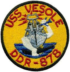DDR-878 USS Vesole
Namesake. Kay Kopl Vesole (1913-1943) posthumously awarded the Navy Cross for actions at Bari, Italy
Laid down. 3 Jul 1944
Launched. 29 Dec 1944
Commissioned. 23 Apr 1945
Decommissioned. 1 Dec 1976
Stricken. 1 Dec 1976
Motto. "Going on Before"
Fate. Sunk as target, 14 Apr 1983
Class and type. Gearing-class destroyer
Displacement:	
2,616 long tons (2,658 t) standard
3,460 long tons (3,520 t) full load
Length. 390.5 ft (119.0 m)
Beam. 40.9 ft (12.5 m)
Draft. 14.3 ft (4.4 m)
Installed power:	
4 × boilers
60,000 shp (45,000 kW)
Propulsion:	
General Electric steam turbines
2 × shafts
Speed. 36.8 kn (68.2 km/h; 42.3 mph)
Range. 4,500 nmi (8,300 km; 5,200 mi) at 20 kn (37 km/h; 23 mph)
Complement. 350 
Sensors and processing systems. Mk37 GFCS
Armament:	
6 × 5 in (127 mm)/38 cal guns (in 3 x 2 mounts)
16 × 40 mm Bofors AA guns (3 × 4 & 2 × 2)
11 × 20 mm (0.79 in) Oerlikon cannons
2 × Depth charge racks
6 × K-gun depth charge throwers

