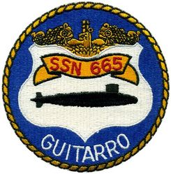 SSN-665 Guitarro
Namesake. The guitarro, a ray of the guitarfish family
Ordered. 18 Dec 1964
Builder. Mare Island Naval Shipyard, Vallejo, California
Laid down. 9 Dec 1965
Launched. 27 Jul 1968
Commissioned. 9 Sep 1972
Decommissioned. 29 May 1992
Stricken. 29 May 1992
Nickname. "Mare Island Mud Puppy"
Fate. Scrapping via Ship and Submarine Recycling Program completed 18 Oct 1994
Class and type. Sturgeon-class submarine
Displacement:
3,860 long tons (3,922 t) light
4,268 long tons (4,336 t) full
408 long tons (415 t) dead
Length. 292 ft 3 in (89.08 m)
Beam. 31 ft 8 in (9.65 m)
Draft. 28 ft 8 in (8.74 m)
Installed power. 15,000 shaft horsepower (11.2 megawatts)
Propulsion. One S5W nuclear reactor, two steam turbines, one screw
Speed:
15 knots (28 km/h; 17 mph) surfaced
25 knots (46 km/h; 29 mph) submerged
Test depth. 1,300 feet (400 meters)
Complement. 108
Armament. 4 × 21-inch (533 mm) torpedo tubes

