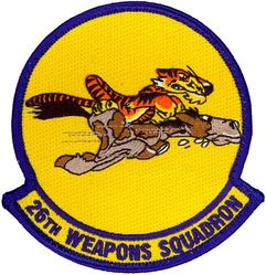 26th Weapons Squadron 
Constituted as 26 Pursuit Squadron (Interceptor) on 20 Nov 1940. Activated on 15 Jan 1941. Redesignated: 26 Pursuit Squadron (Fighter) on 12 Mar 1941; 26 Fighter Squadron (Twin Engine) on 15 May 1942; 26 Fighter Squadron on 1 Jun 1942. Inactivated on 13 Dec 1945. Activated on 15 Oct 1946. Redesignated: 26 Fighter Squadron, Jet-Propelled, on 19 Feb 1947; 26 Fighter Squadron, Jet, on 10 Aug 1948; 26 Fighter-Interceptor Squadron on 1 Feb 1950. Inactivated on 9 Apr 1959. Redesignated 26 Flying Training Squadron on 13 Dec 1989. Activated on 19 Jan 1990. Inactivated on 1 Oct 1992. Redesignated 26 Weapons Squadron on 18 Sep 2008. Activated on 30 Sep 2008.
Emblem. Originally approved on 30 Mar 1945; newest rendition approved on 28 Jan 2009.

