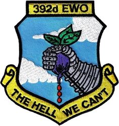 392d Training Squadron Morale
EWO= Emergency War Order.  The patch is from Vandenberg's now-defunct 392d Training Squadron, which at the time did both space training and missile training.  The unit was divided into two flights:  DOB (missiles) and DOC (space).  DOB was further divided into sections:  DOBA (academics, which taught the weapon system; DOBE (EWO, which conducted training on the receipt and processing of the Emergency War Orders); and DOBM (MPT, which trained the students in the Missile Procedures Trainer, i.e., the simulator of a Launch Control Center).
