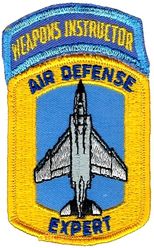 Tactical Air Command F-4 Air Defense Expert Weapons Instructor
These aircraft specific qualification patches replaced the ADC ones when ADC was absorbed by TAC in 1979. Part of Air Defense, Tactical Air Command (ADTAC), which was active 79-85. Worn into the 1980s then discontinued. WI tab sewn to patch as used.
