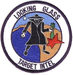2d Airborne Command and Control Squadron Intelligence
2 ACCS/DOCI functional patch (usually referred to as the "spook patch") created in an effort to preclude future obsolescence as a result of office symbols changing. As can be seen when comparing with the earlier Target Intel patch, the office symbol has been replaced with "Looking Glass." 
