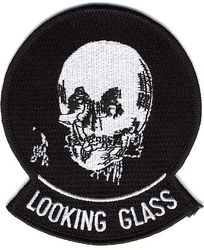 2d Airborne Command and Control Squadron Morale
Morale patch produced in 1993 for the "Doomsday Warriors" who fly airborne alert on the Looking Glass. It attempts to portray Charles Allan Gilbert's famous painting titled "All Is Vanity" (depicting a lady sitting at a vanity with a large circular mirror that gives the illusion of a human skull, popularized more recently on Def Leppard's "Retro Active" album cover). I'm almost embarrassed to admit that this patch was my idea because it turned out so poorly (I should have had it screened rather than embroidered). 
